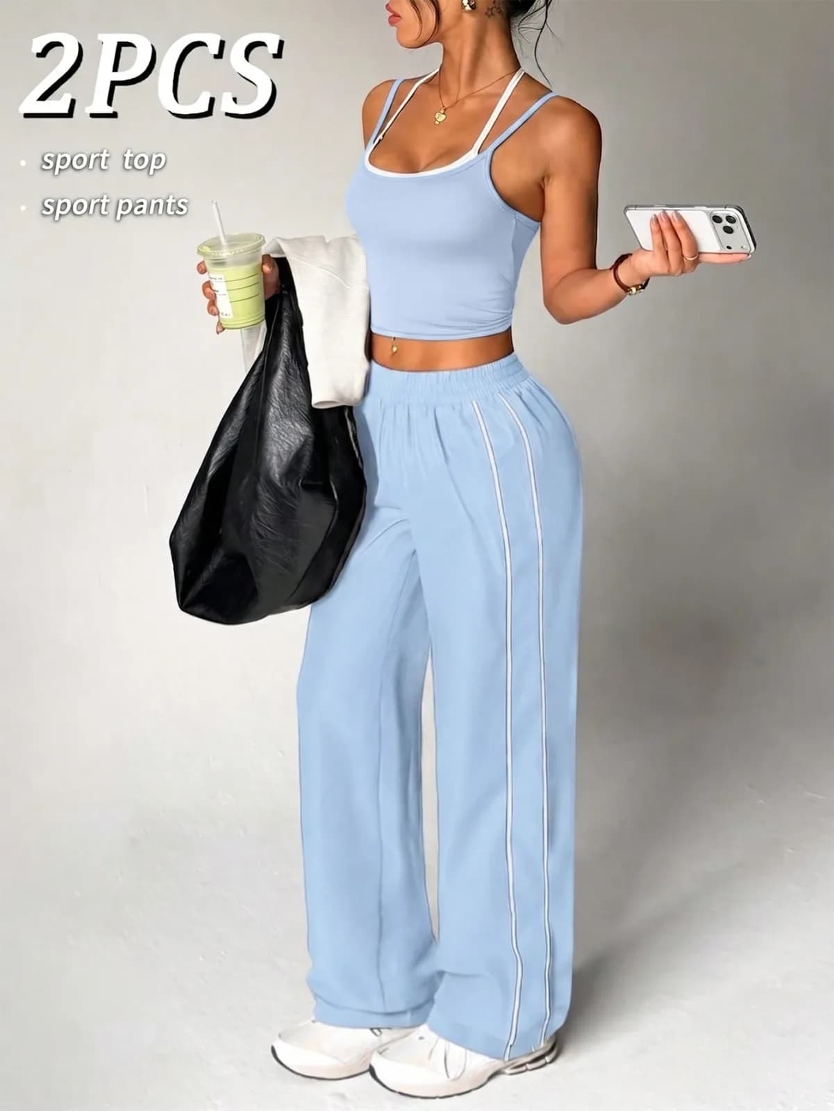 Ensemble de sport 2 pièces bleu marine débardeur court et pantalon large à liserés