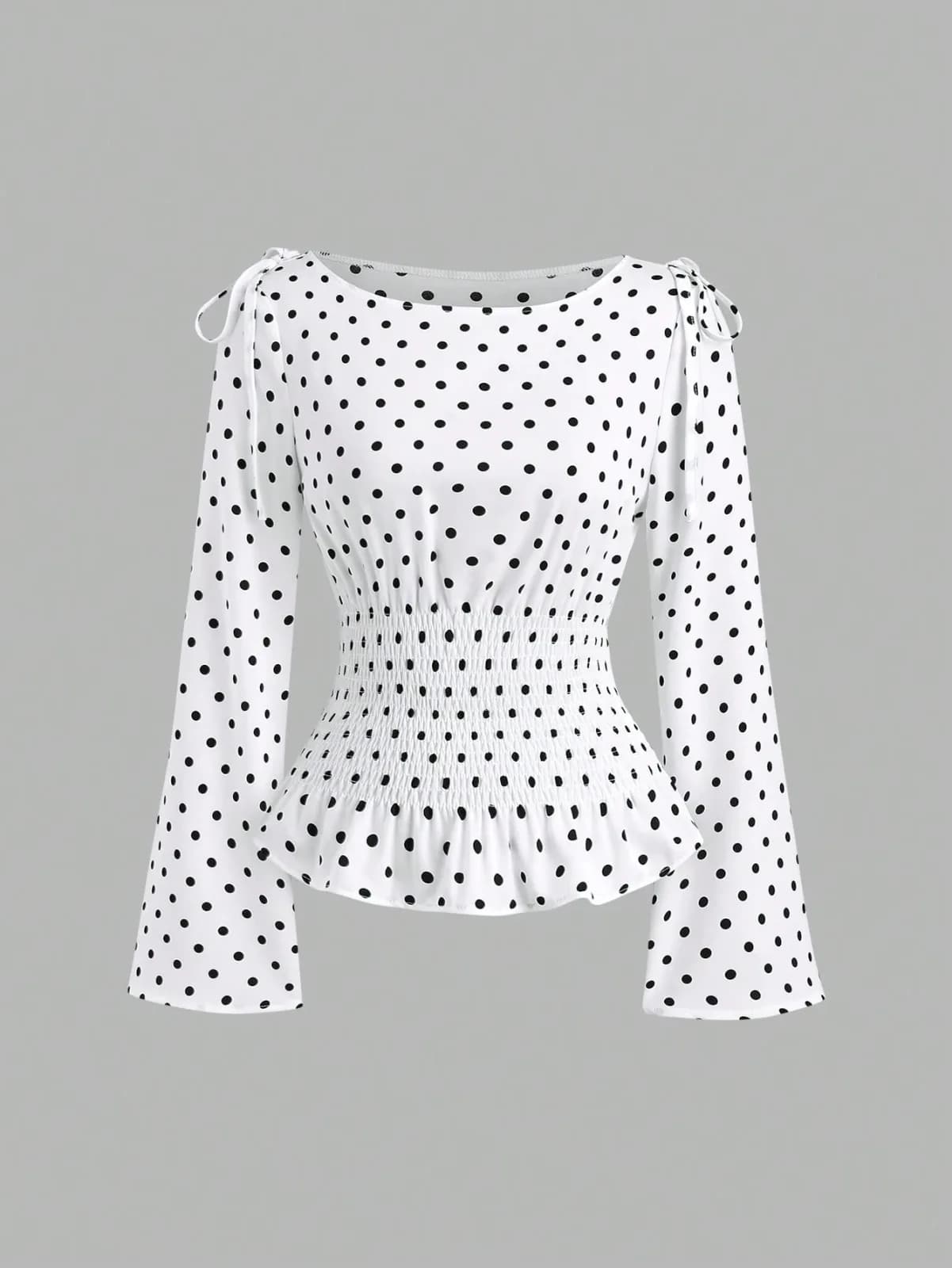 blouse à pois avec taille smockée et nœuds aux épaules