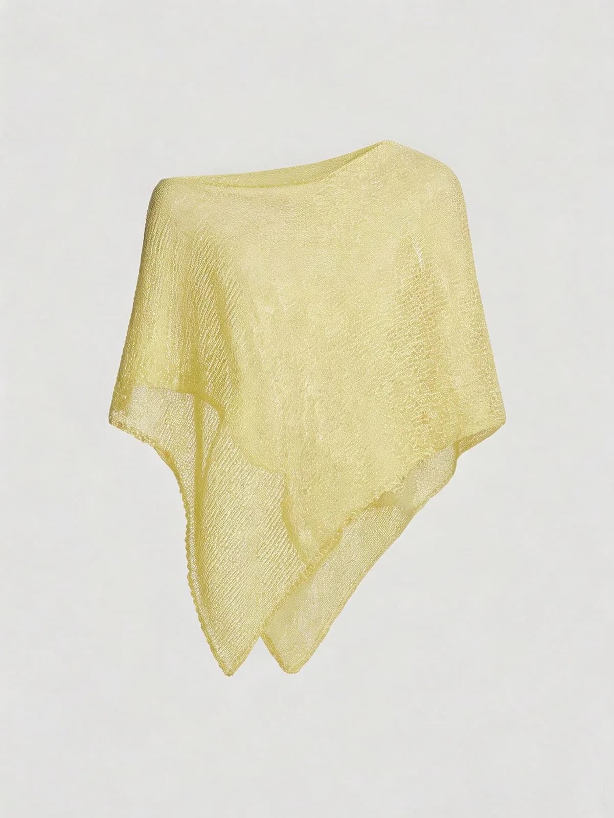 poncho asymétrique en maille ajourée