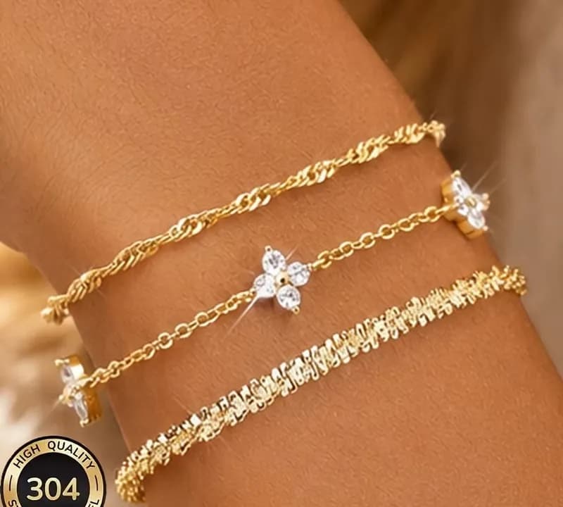 Ensemble de 3 bracelets dorés en acier inoxydable avec motif fleur en strass