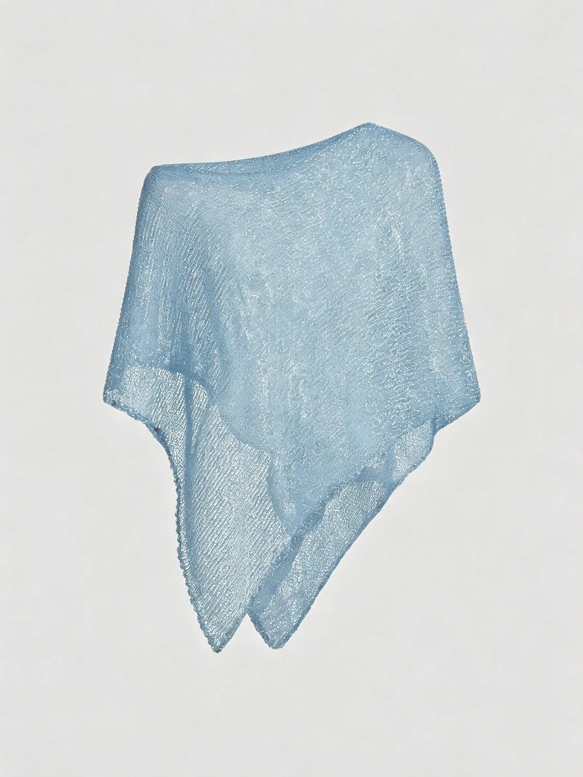 poncho asymétrique en maille ajourée