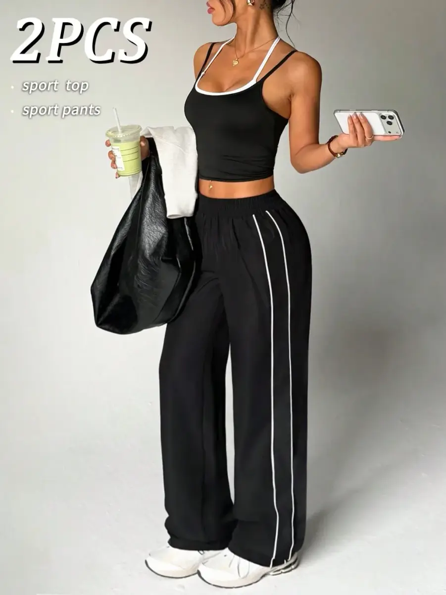 Ensemble de sport 2 pièces bleu marine débardeur court et pantalon large à liserés