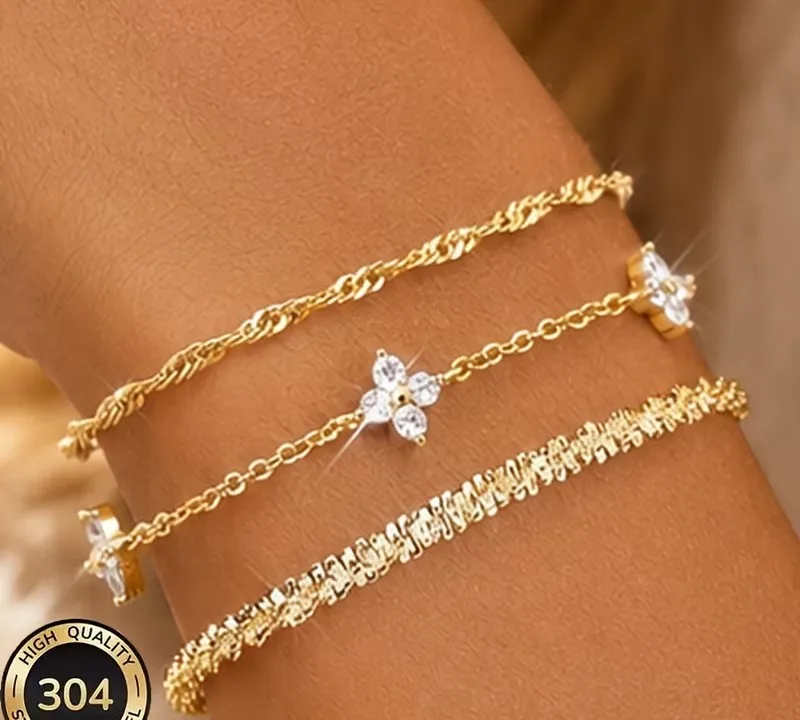 Ensemble de 3 bracelets dorés en acier inoxydable avec motif fleur en strass