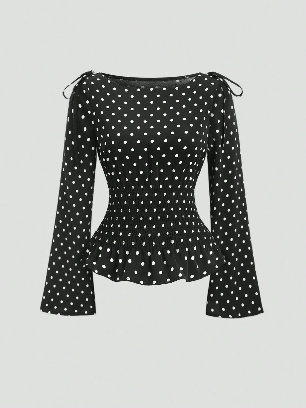 blouse à pois avec taille smockée et nœuds aux épaules